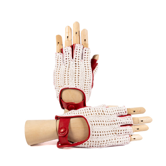 Women's white crochet driving gloves with red leather accents, showcasing elegant design and Italian craftsmanship.