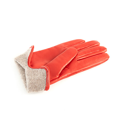 Little Red leather gloves featuring a soft cashmere lining, showcasing vibrant color and elegant Italian design.