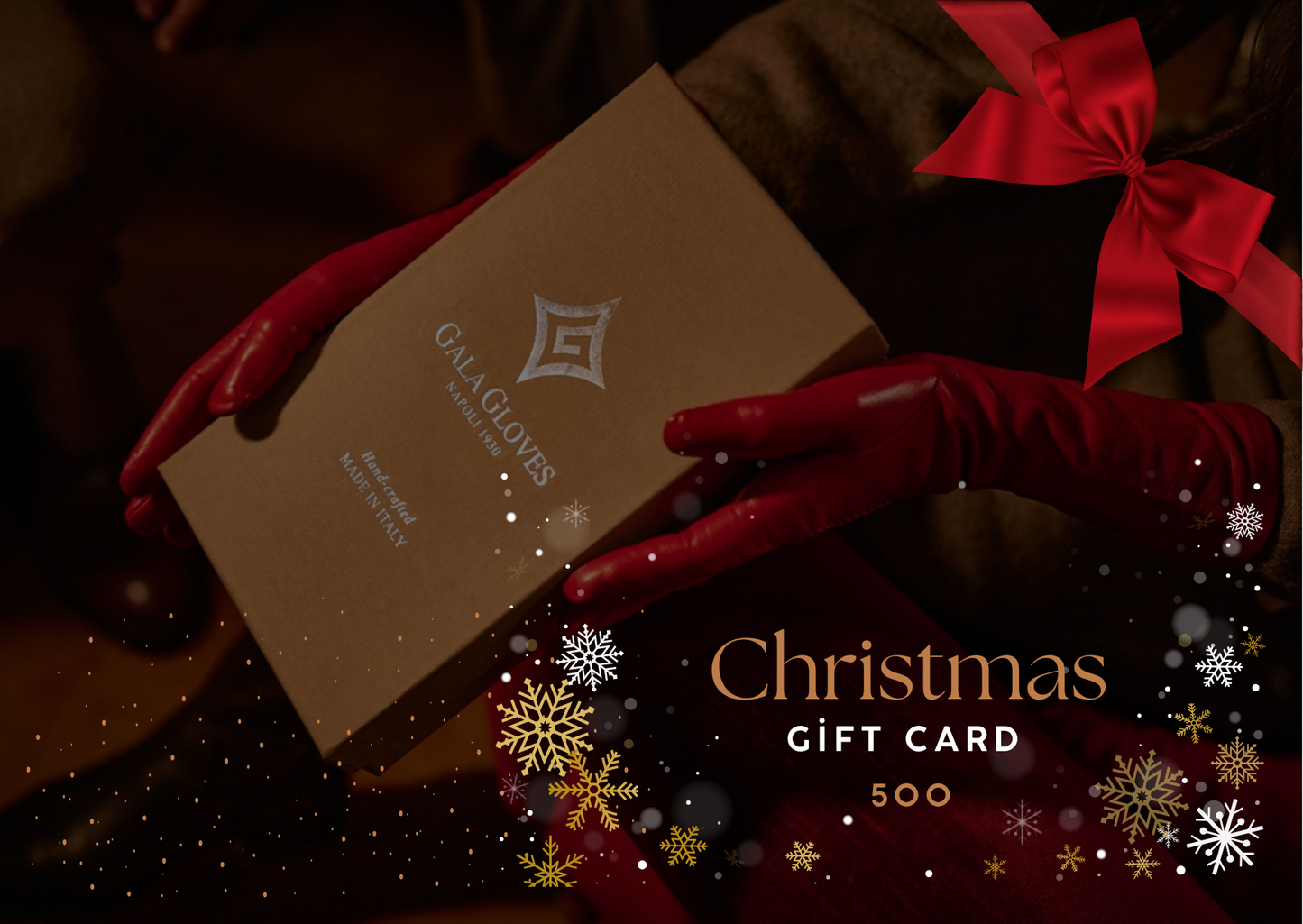 Red leather-gloved hands elegantly presenting a Gala Gloves gift card, adorned with festive decorations and a red bow.