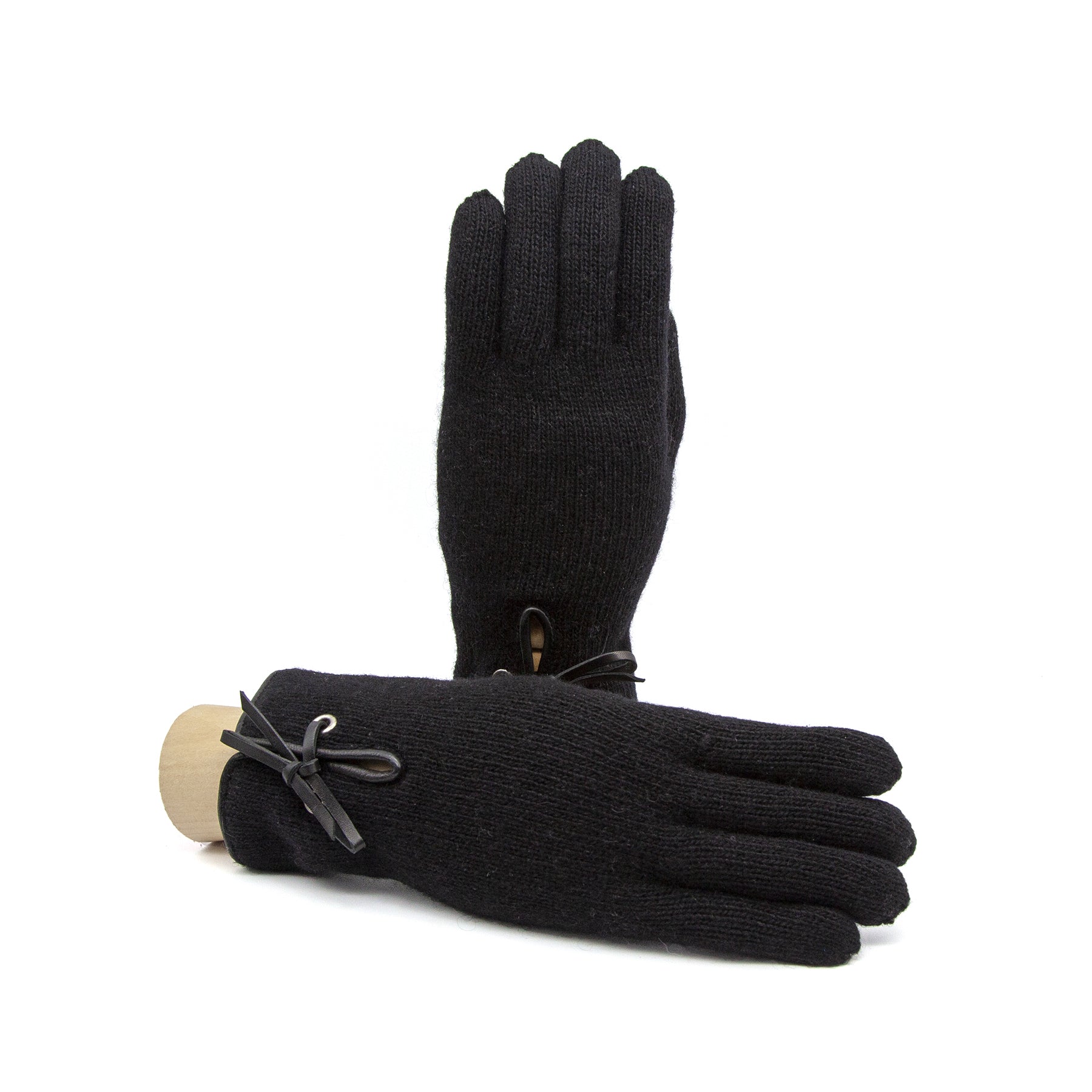 Black cashmere gloves featuring elegant detailing and a refined design, showcasing Italian craftsmanship.