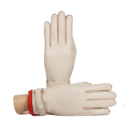 Ladies' deerskin leather gloves in cream with vibrant cashmere lining, showcasing elegant Italian craftsmanship and design.