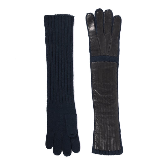 Ladies' long cashmere gloves in navy, featuring a ribbed knit cuff and sleek leather detailing for a luxurious touch.