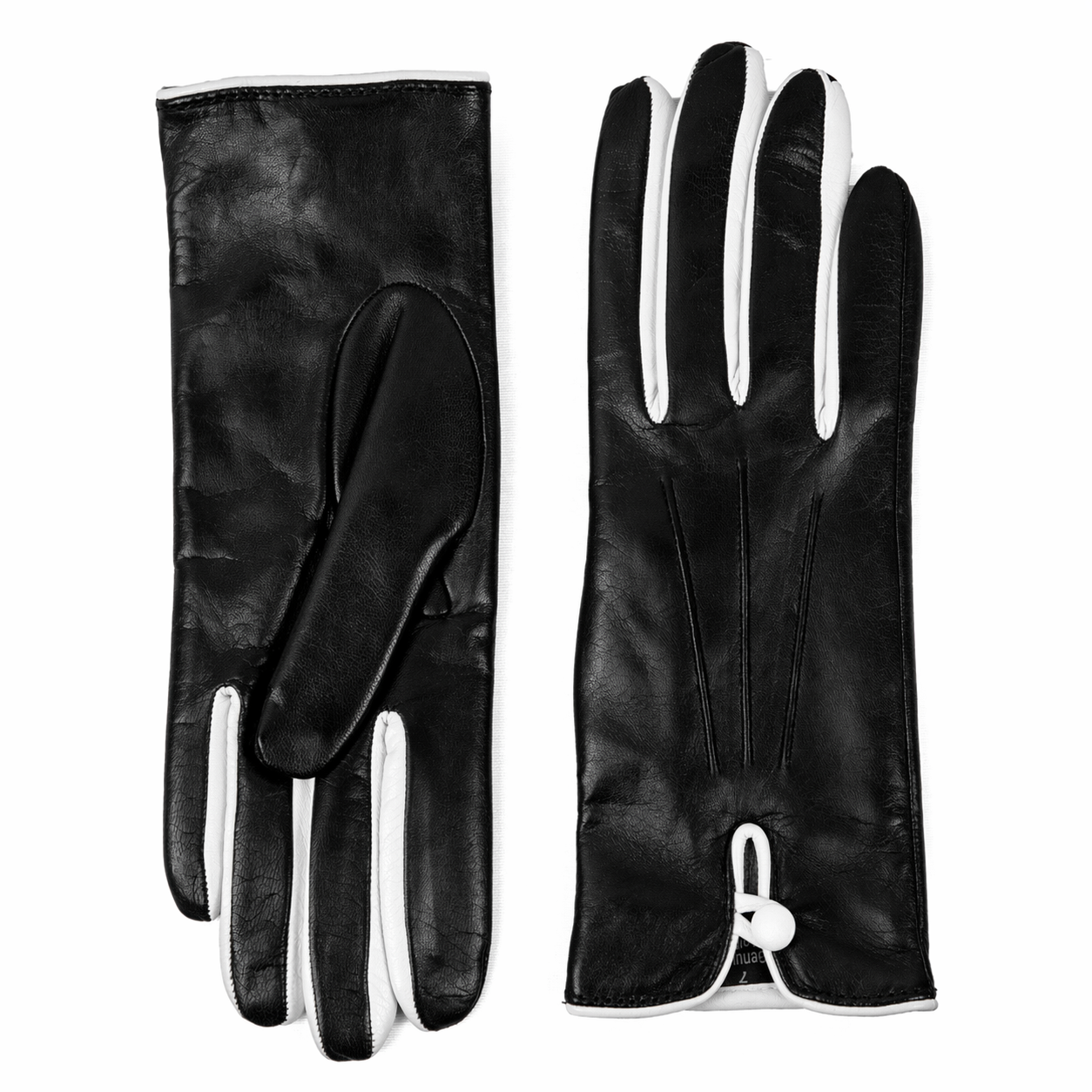 Women's black nappa leather gloves with white detailing and silk lining, showcasing elegant Italian craftsmanship and design.