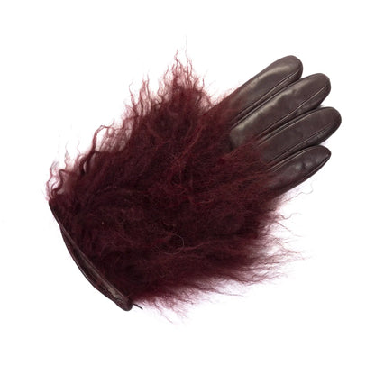 Womens burgundy nappa leather gloves featuring luxurious pluffy Mongolian fur for an elegant winter accessory.