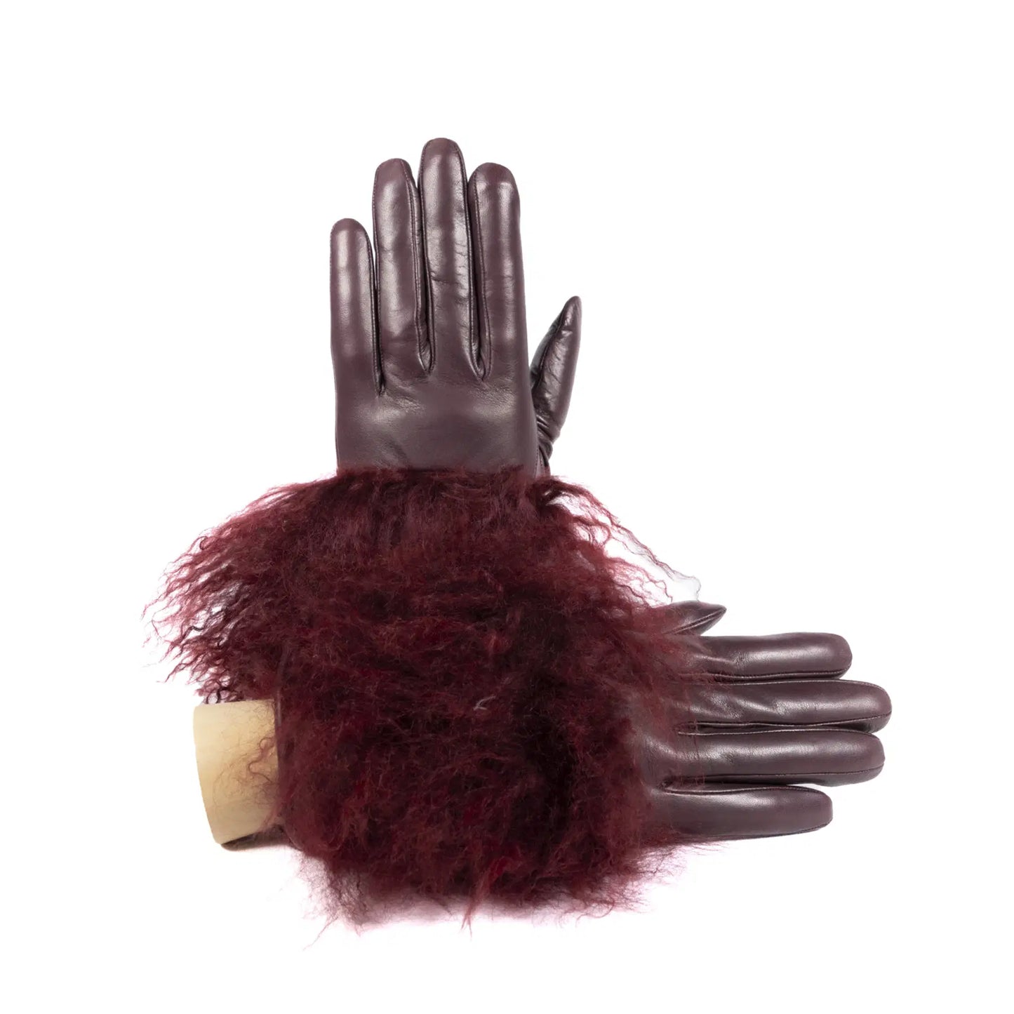 Womens burgundy nappa leather gloves featuring a luxurious pluffy Mongolian fur cuff for added warmth and elegance.
