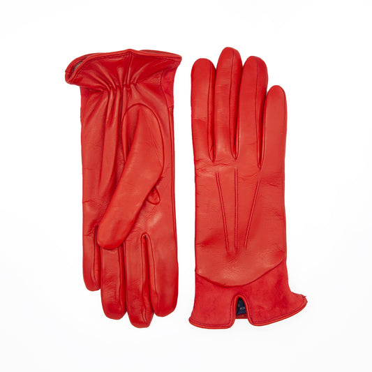 Women's red nappa leather gloves featuring a sleek design and elegant suede panel insert, lined with soft cashmere.