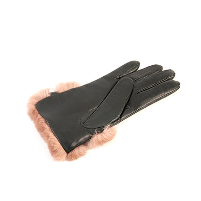 Ladies' black nappa leather gloves featuring a large natural fur cuff and strap, lined with soft cashmere for added warmth.