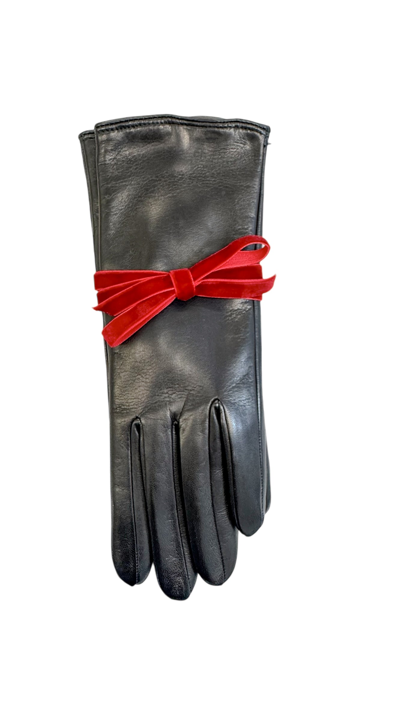 Little black leather gloves elegantly tied with a red velvet ribbon, showcasing Italian craftsmanship and timeless style.