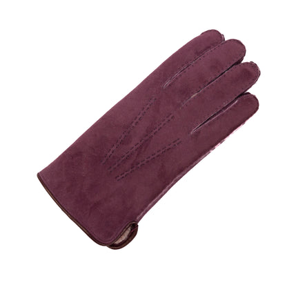 Men's curly lambskin glove in deep burgundy, featuring a leather piped edge and side opening for an elegant touch.