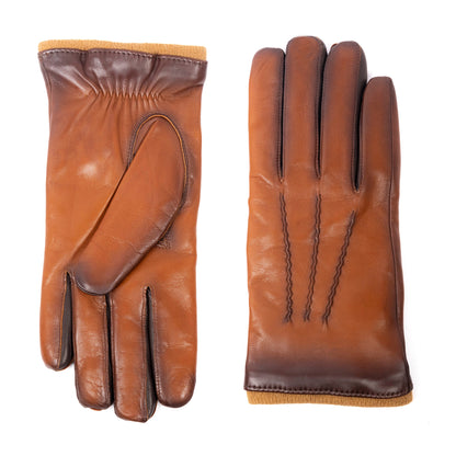 Men's vintage style leather gloves featuring rich brown hues and a soft cashmere lining for warmth and elegance.