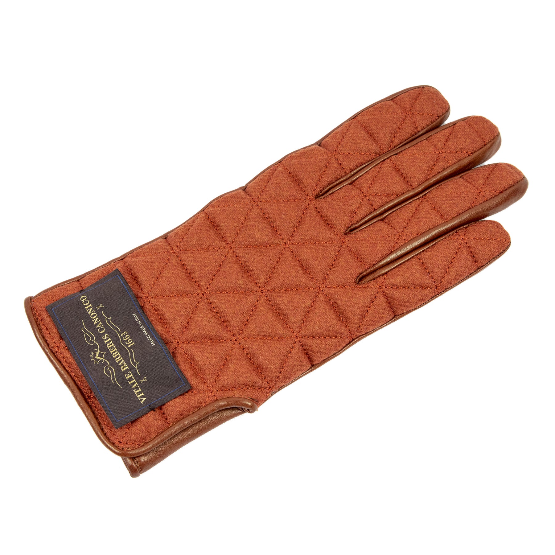 Quilted camel color fabric and nappa leather glove showcasing Italian craftsmanship and elegant design details.