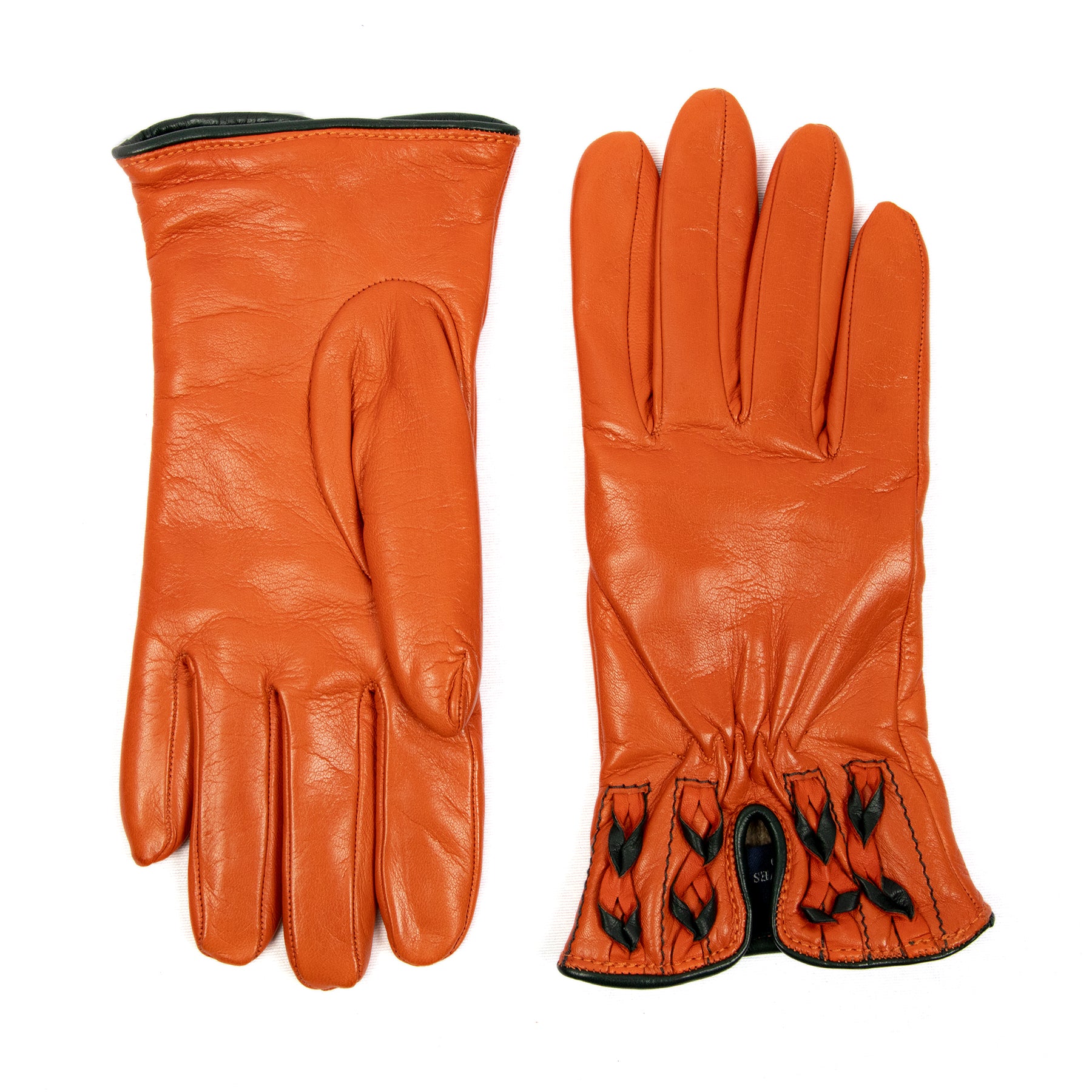 Woman's orange nappa leather gloves and bicolour braided cuff