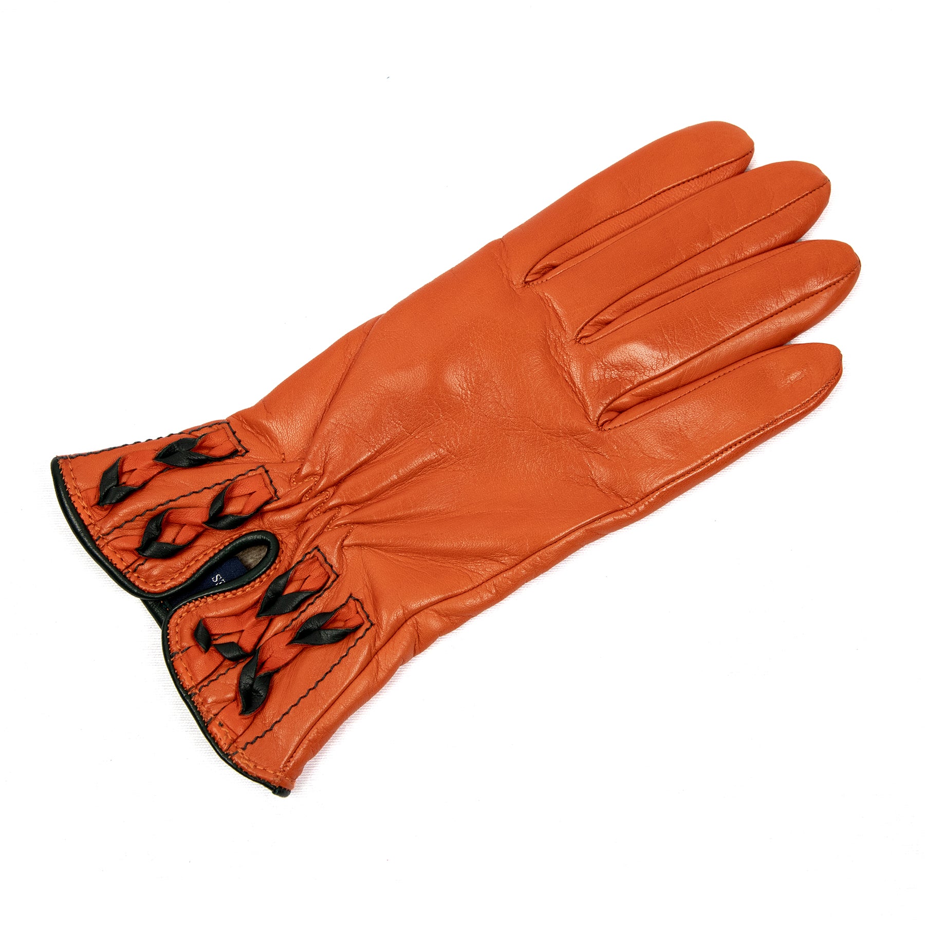 Woman's orange nappa leather gloves and bicolour braided cuff